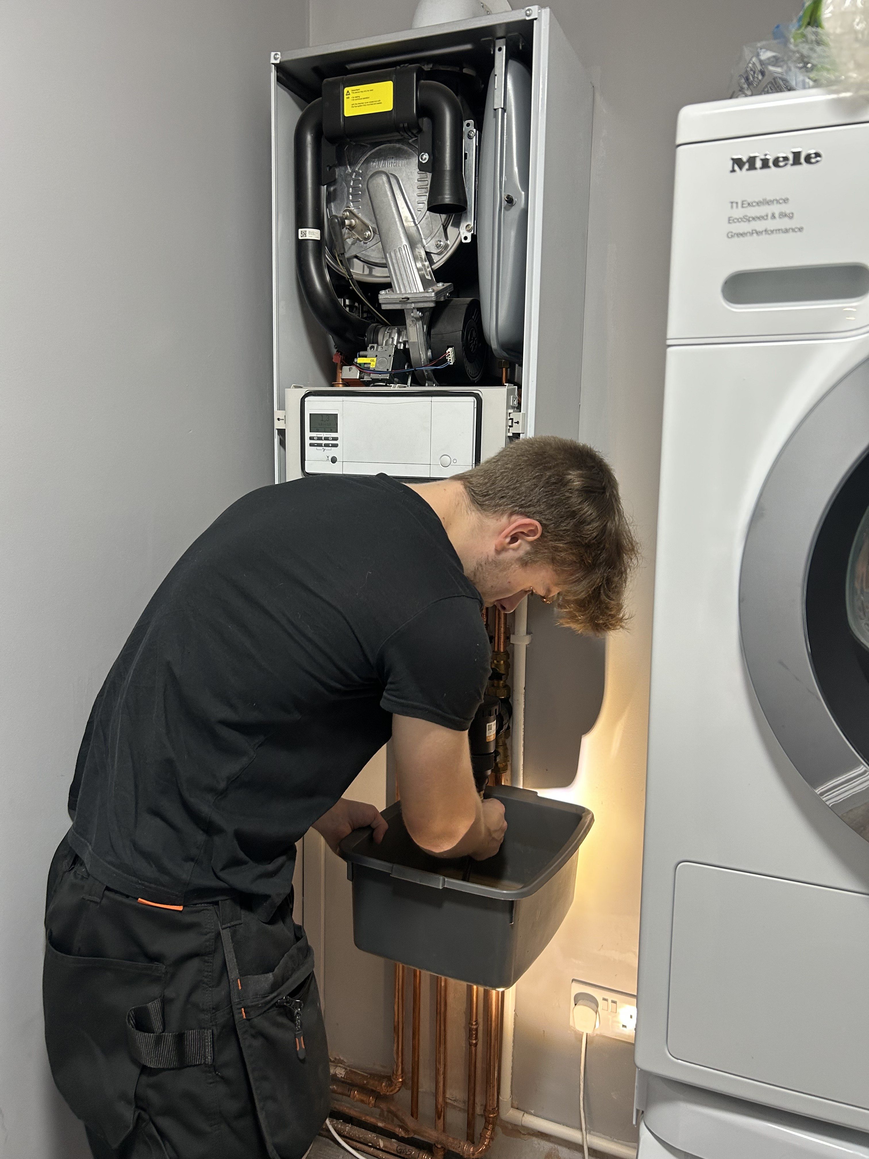 Gas engineer servicing a Vaillant boiler in Chester